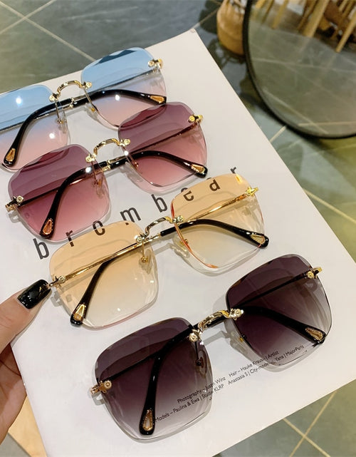 Load image into Gallery viewer, Vintage Clip Frameless UV Sunglasses
